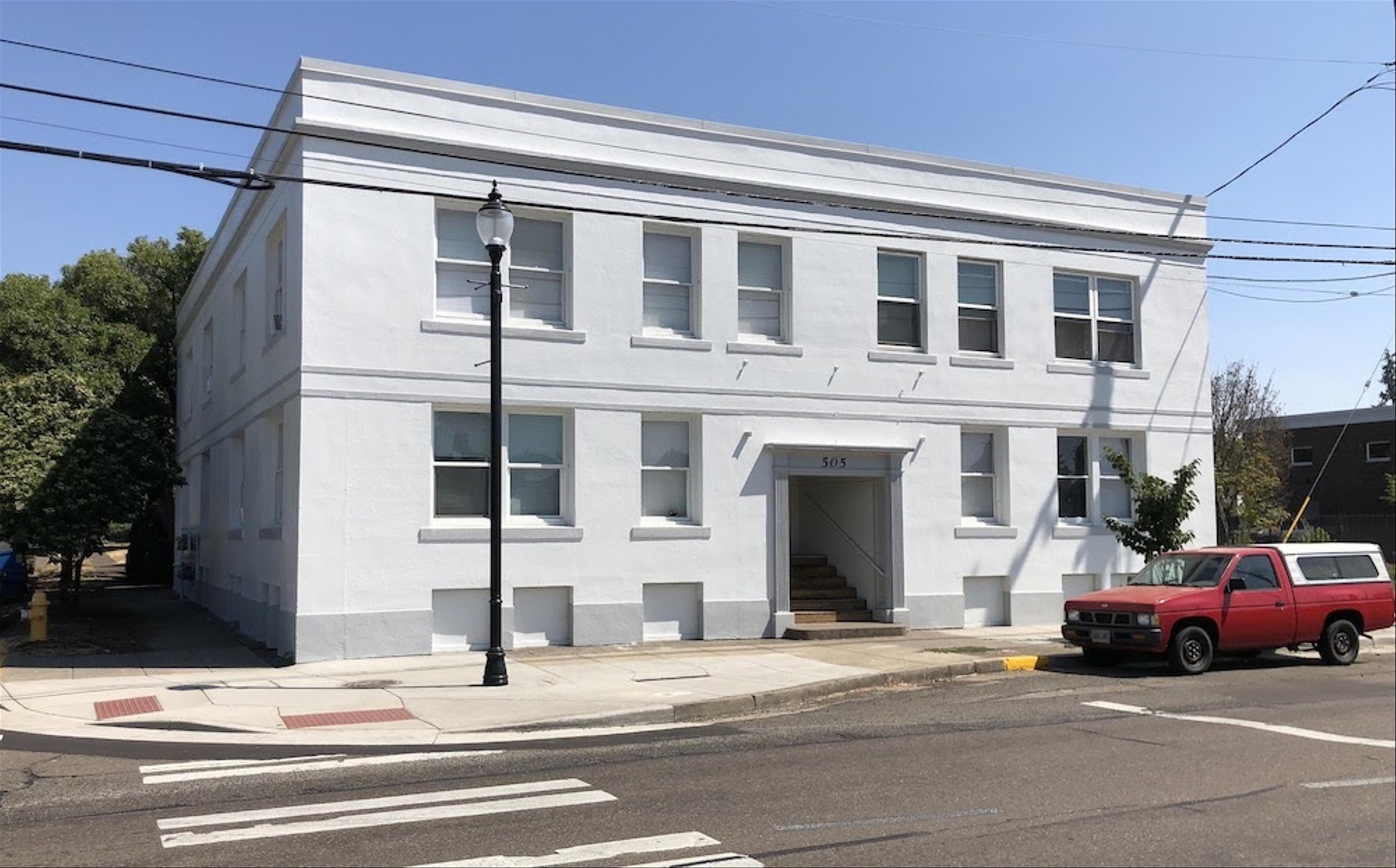 White 2-story apartment building